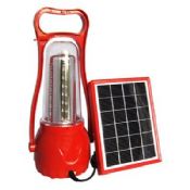 Solar emergency light with mobile phone charger images
