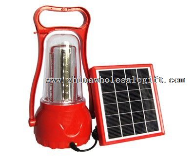 Solar emergency light with mobile phone charger