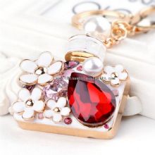 Diamantes de imitación personalizada 3D Perfume llavero images